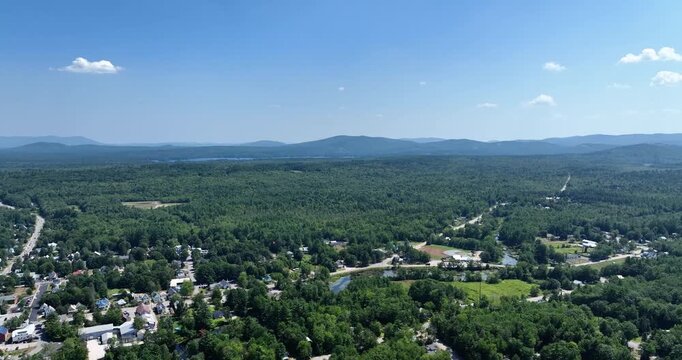 Aerial view of Conway, New Hampshire against the beautiful summer mountains