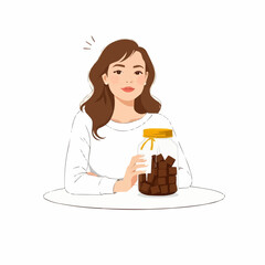 Young woman holding jar of chocolate pieces at table indoors  