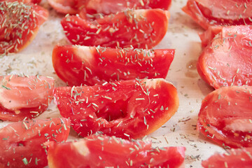 sliced sun-dried tomatoes with herbs and salt