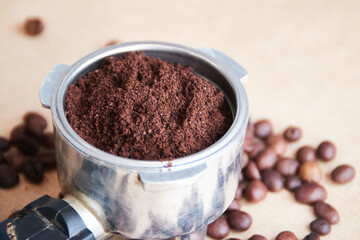 coffee beans and coffee machine horn
