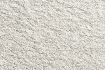 Close-up view of a light beige textured surface