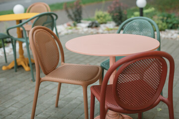 Outdoor cafe tables.  A summer terrace cafe in the city.