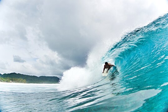 Surfing Waves in Siargao with a local