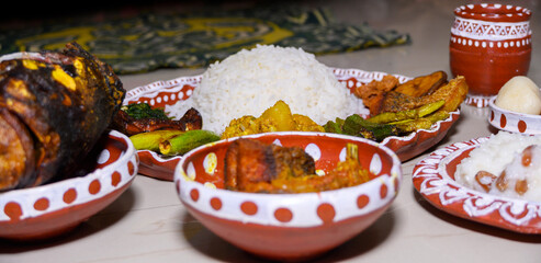 Plate of Traditional Rice and Side Dishes Served on Decorative Plates