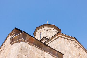 Fototapeta premium Scenic view of the Gergeti Trinity Church in the Caucasus Mountains, northern Georgia