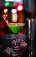 Editorial image of a street view showing a cafe exterior with tables and chairs outside. Concept of European city lifestyle, dining, and tourism.