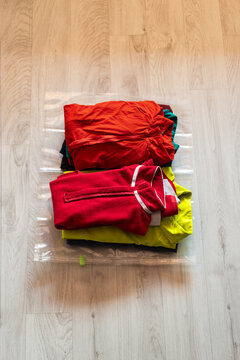Clothing stacked before compression bag use