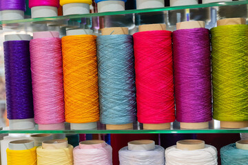 Spools of colored thread on the store sheet