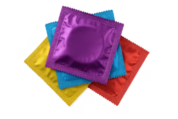 Four colorful condoms promoting safe sex and disease prevention, isolated on a transparent background