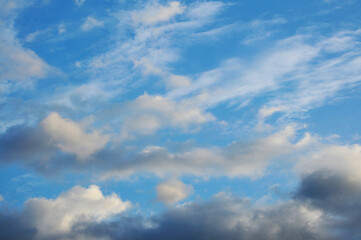 Beautiful storm clouds on a summer night with pinks and blues.