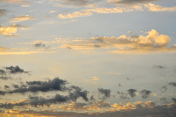 Beautiful storm clouds on a summer night with pinks and blues.