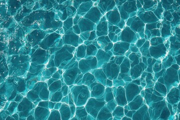 Shimmering water surface reflecting sunlight, creating a beautiful ripple pattern in shades of blue and teal
