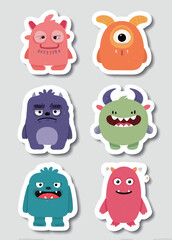 Fototapeta premium Six unique cartoon monsters are displayed on a light gray background, showcasing diverse colors and facial expressions, perfect for kids decorations or crafts.