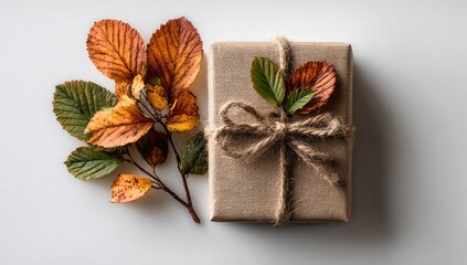 Gift box with autumn leaves