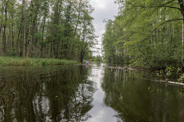  Distant Kayaker on a Calm River