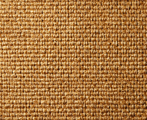 A close-up texture of woven burlap showcasing natural fibers in warm brown tones, ideal for creative projects.