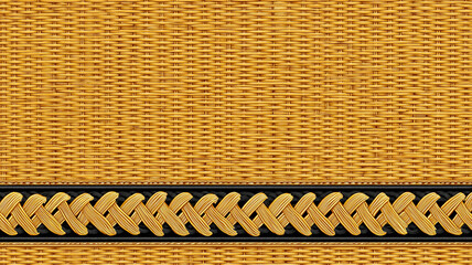 A vibrant yellow woven texture featuring a distinctive black braided detail, perfect for design projects.