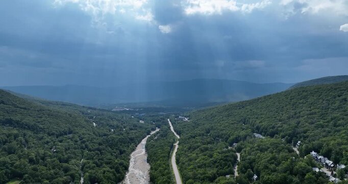 Drone view of the Kancamagus highway and White Mountains in New Hampshire on a cloudy day in summer