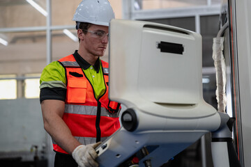 Smart Caucasian engineer work setup AI automated in robotics electronics engineering laboratory....