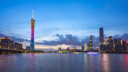 Guangzhou China buildings tower over Pearl River New City.