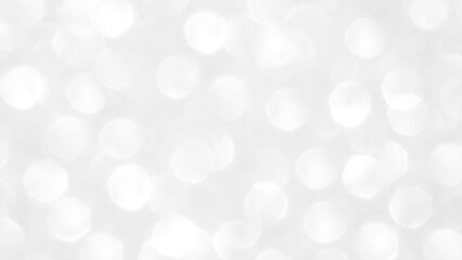 White and gray bokeh background. Photo can be used for the concepts of New Year, Christmas, Wedding Anniversary and all celebrations.