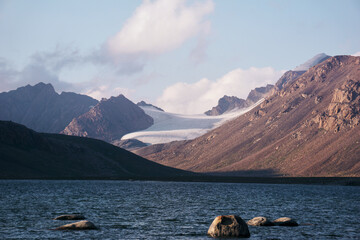 mountain lake with a view of a snow-capped peak - Kyrgyzstan, Tien Shan, Central Asia