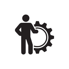 A black and white graphic of a person standing next to a gear with their hand on the gear symbol