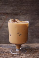 Iced coffee on wood background