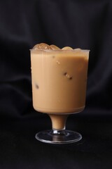 Iced coffee on black background