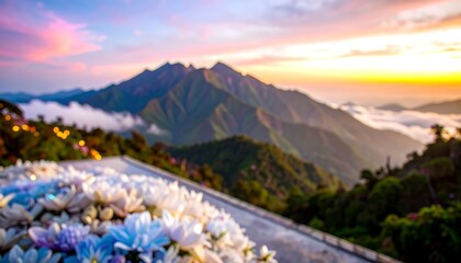 Obraz premium A breathtaking mountain vista, softly blurred, showcases a sunrise over a landscape of towering peaks, with a foreground of floral arrangements in pastel colors.