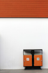 Outdoor garbage containers with two separation containers, for recyclable and non-recyclable.