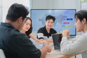 business workshop brings together professionals to brainstorm ideas and discuss strategy. They leverage AI for financial analysis to calculate budget and predict growth, embracing a modern business 