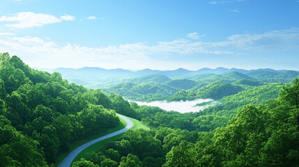 Serene road winding through lush green hills under clear blue sky, creating peaceful and inviting atmosphere