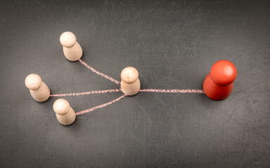 Leader figure connected to team members with chalk lines symbolizing communication and authority