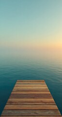 Obraz premium Calm wooden pier extending into tranquil water.