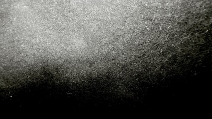 abstract dark rough grunge stone texture with scratched surface in black and white gradient for background or design overlay