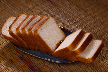 Indian breakfast soft bread for eating with Tea or Milk isolated on jute background 