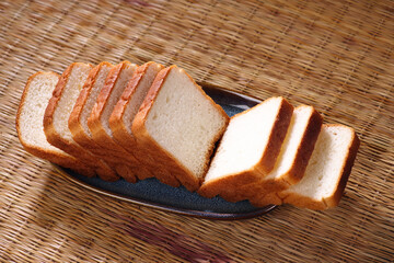 Indian breakfast soft bread for eating with Tea or Milk isolated on jute background 
