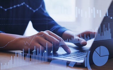 Analyzing financial data on a laptop with digital charts and graphs overlay