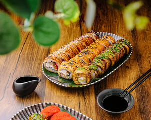 Delicious sushi rolls served on a wooden table in a cozy restaurant