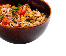 Delicious noodle bowl with chicken, vegetables, and sesame seeds ready to enjoy