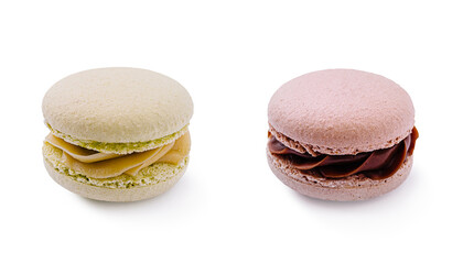 Colorful macarons displayed on a clean white surface with unique flavors