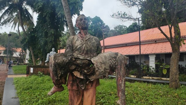 Historical bronze statue of freedom fighters located within the medieval Portuguese-era Aguada Jail complex, commemorating Goa's liberation struggle in India