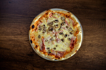 Capricciosa Pizza Served in Restaurant