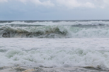 Ocean Waves Crashing on the Shore During an Overcast Day from Hurricane Erin Off Shore