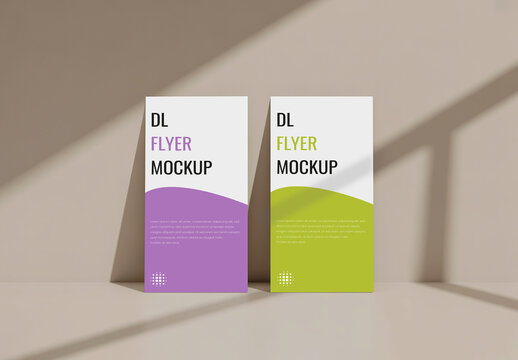 DL Flyer Mockup Duo Leaning on a Wall with Realistic Shadow