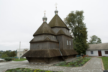 Ukraine Ternopil region wooden church on a cloudy summer day