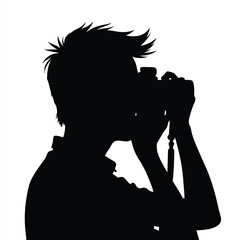 Silhouette of a person holding a camera and taking a photo