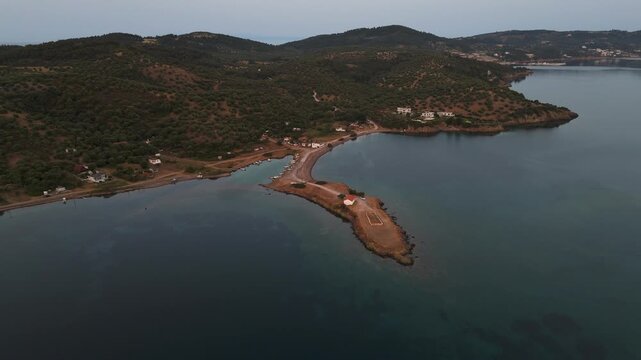 Aerial Drone Birds Eye View Of Calm Aegean Sea Off Kassandra Coast, Halkidiki, Greece At Hazy Sunrise.