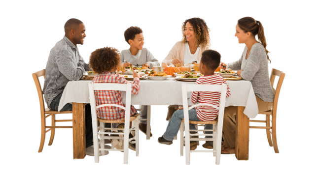 Cheerful multi generational family sharing a holiday meal full of diverse food while seated around the table at home celebrating special occasion together spending quality time